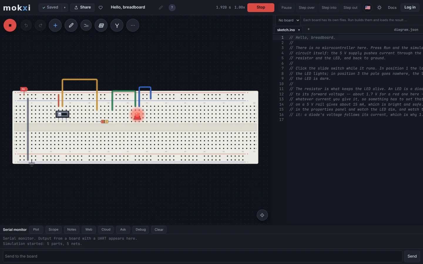 The Mokxi editor running a tidy breadboard circuit, wired at the real 0.1 inch pitch, with its LED lit.